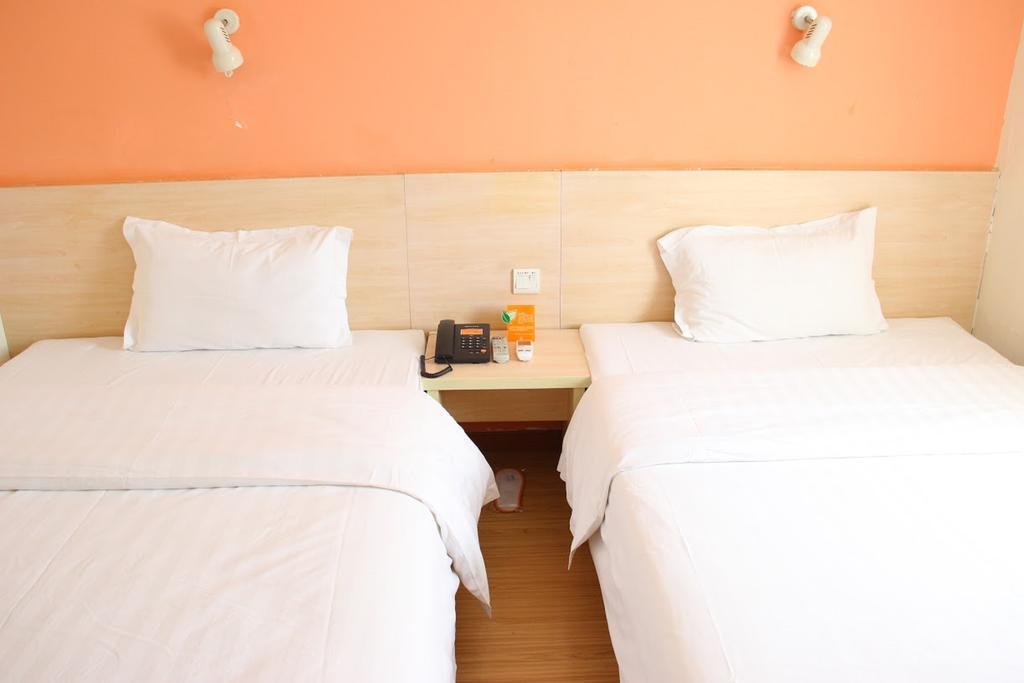 7Days Inn Dalian Gangwan Square Station Port Δωμάτιο φωτογραφία